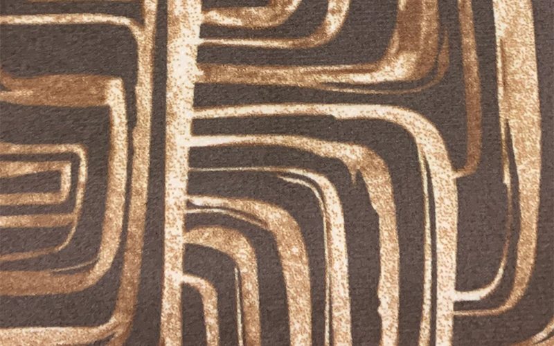 Geometric patterned fabric for hospitality accent furniture