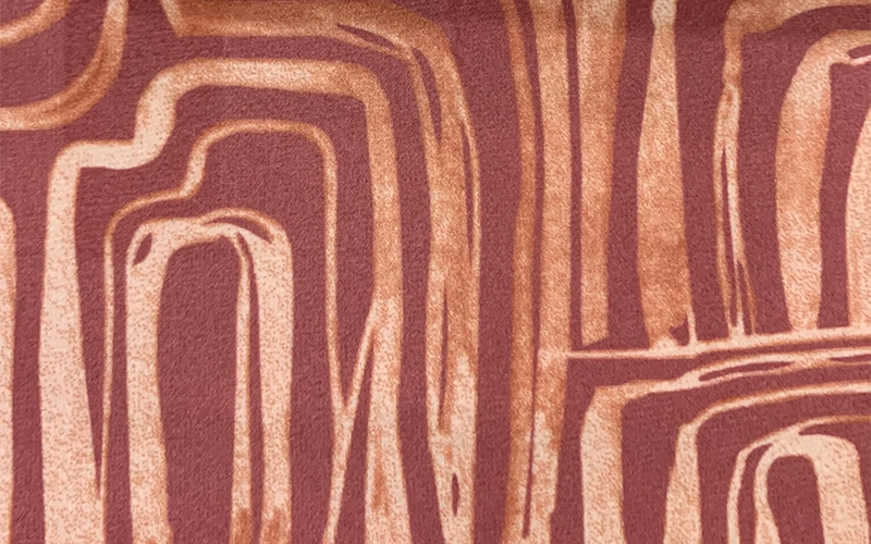 Abstract patterned fabric upholstery for hospitality furniture