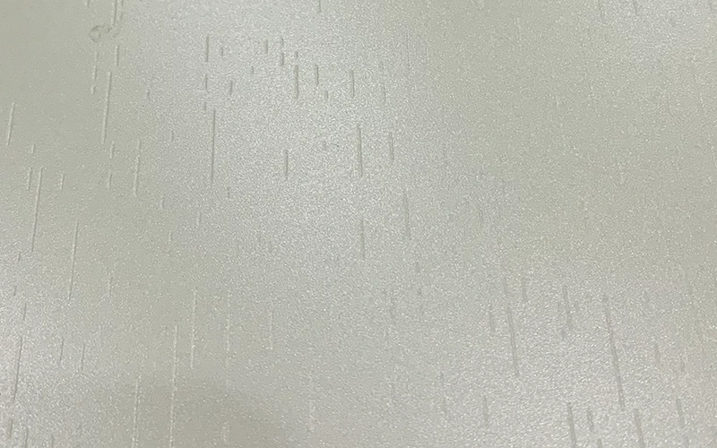 Creamy white laminate surface for modern hospitality interiors