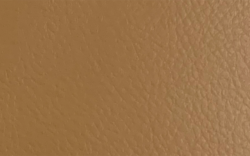 Tan vinyl upholstery material for hotel seating and headboards