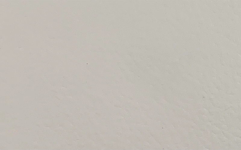 Light gray vinyl upholstery finish for hotel furniture