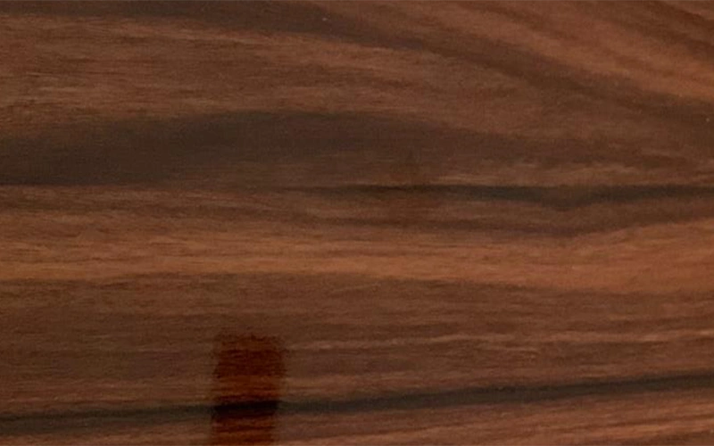 Black vintage woodgrain finish for modern hospitality furniture